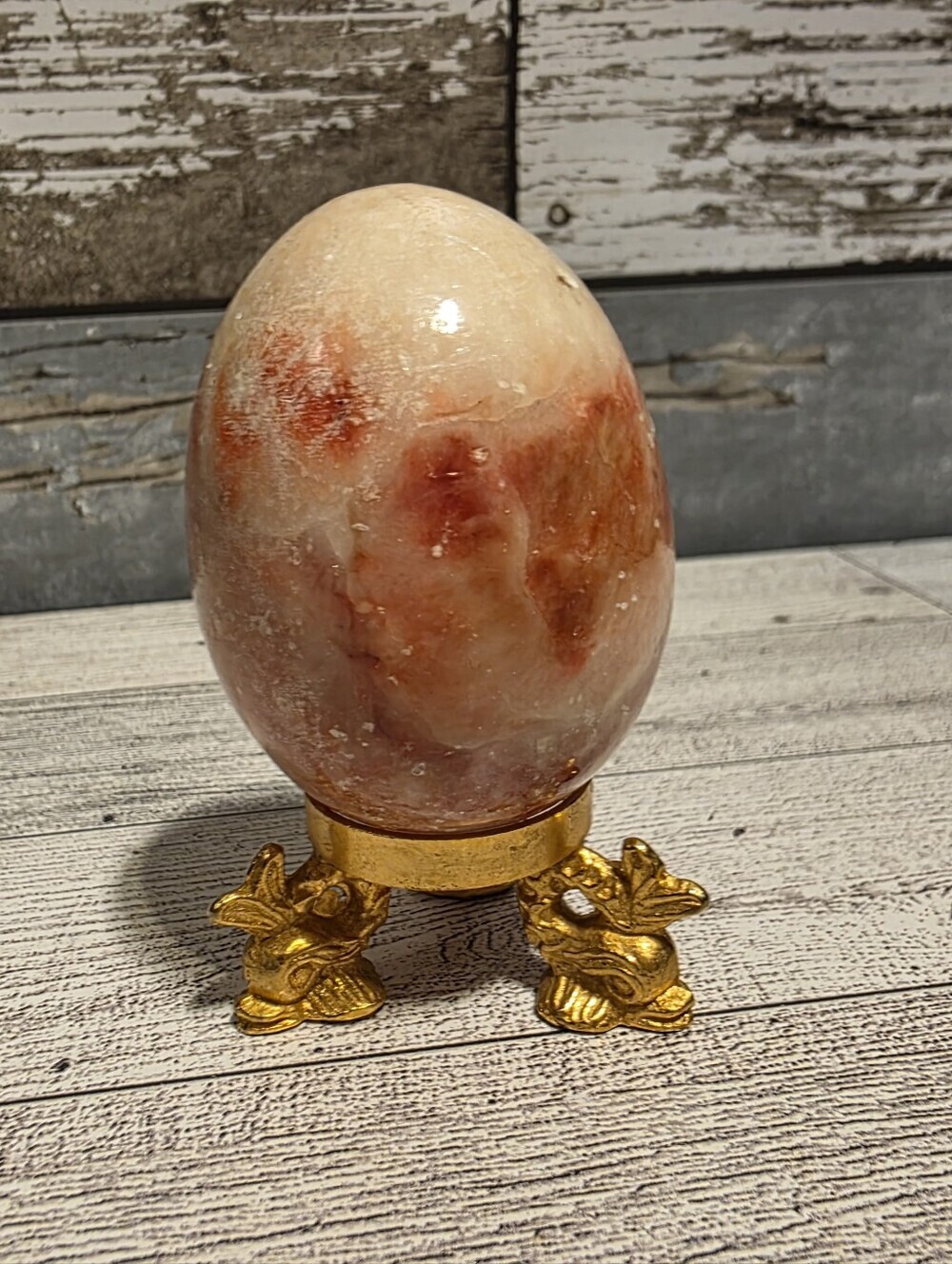 Natural Orange and Cream Egg Stone Decor on Gold Stand - Home Accents